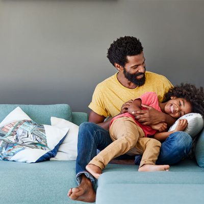 Father and young son having fun